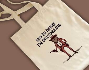 Hold on partner I’m overstimulated tote bag, funny cowboy frog tote bag