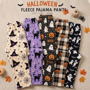 May include: Five pairs of fleece pajama pants featuring Halloween patterns: cream with witch hats and spiderwebs, purple with black cats and moons, black with ghosts and pumpkins, tan plaid with pumpkins, and black with white ghosts and bats.