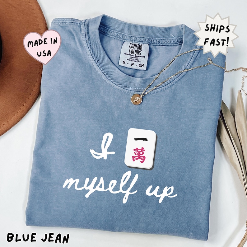 comfort colors blue jean mahjong shirt featuring Crak tile joke design, relaxed fit tee for women who love mahjong and cozy hobbies, great gift for book lovers who also enjoy games