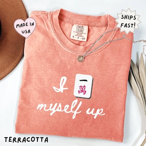comfort colors terracotta mahjong shirt featuring “I crack myself up” design with a Crak mahjong tile, funny inside joke tee for mahjong players who understand tile humor, perfect gift for mahjong lovers, game night outfits, or mahjong club members