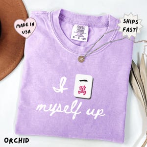 comfort colors orchid lavender mahjong shirt with playful Crak tile graphic and funny quote, cute feminine gift for mahjong players, daughters, friends, or anyone who loves tile games