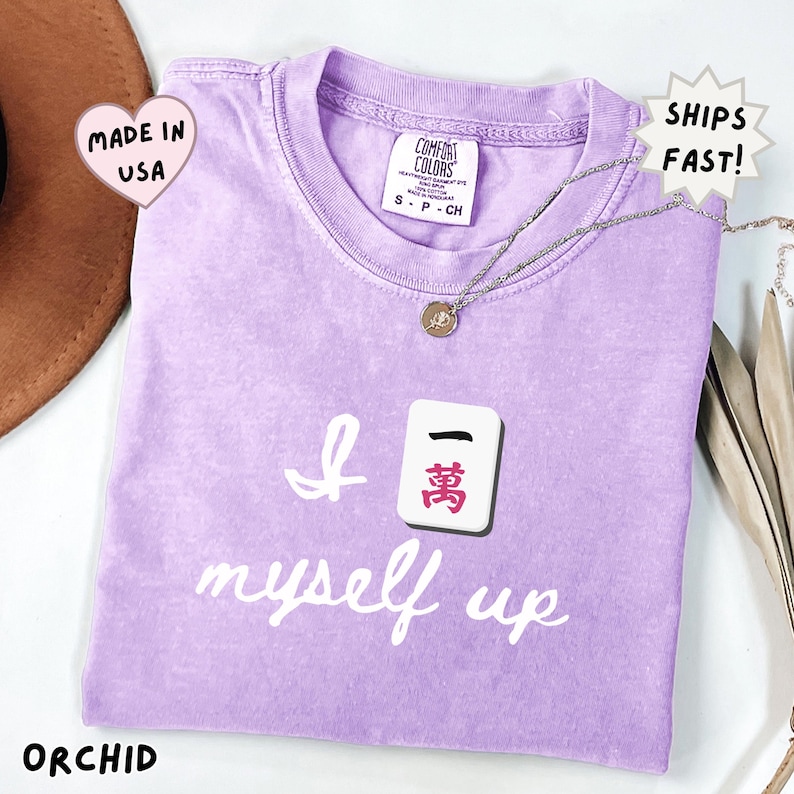 comfort colors orchid lavender mahjong shirt with playful Crak tile graphic and funny quote, cute feminine gift for mahjong players, daughters, friends, or anyone who loves tile games