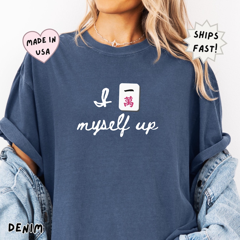 comfort colors denim blue mahjong shirt worn casually, featuring Crak tile and “I crack myself up” phrase, stylish everyday outfit for women who love mahjong and relaxed fashion