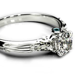 Geeky 4 Claw Triforce Ring - Zelda Inspired Ring with certified Moissanite and Blue Diamond