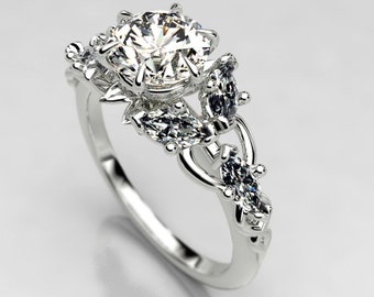 ホワイトゴールドのモアッサナイト婚約指輪 – エルフ風ファンタジー爪デザイン