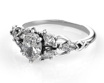 オーバル型モアッサナイト入りエルフ風婚約指輪 – パラジウムホワイトゴールド、妖精デザイン