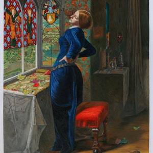 May include: A woman in a blue velvet dress stands in a room with a stained glass window. She is looking out the window and has her hand on her back. There is a red velvet stool in the foreground.