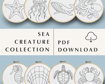 May include: A set of eight black and white line drawings of sea creatures, including a starfish, jellyfish, whale, octopus, seahorse, seashell, turtle, and crab. The drawings are in embroidery hoops, suggesting a craft project.