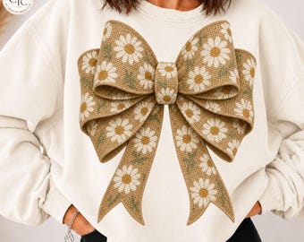 Kokette Schleife (PNG), braunes, strukturiertes Juteband mit Gänseblümchenmuster – trendiges Grafikdesign für Damen-Sweatshirts im Herbst – Weihnachtsgeschenk