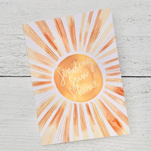 Tarjeta "Enviando sol solo porque sí"