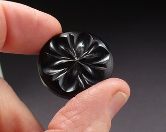 Botón de corte de madera negra y cobre