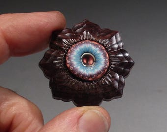 Botón de arcilla polimérica y madera de coco