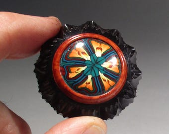 Botón ornamental de madera y arcilla polimérica con forma de caleidoscopio