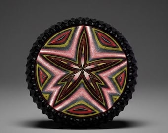 Botón de estrella ornamental de varias capas