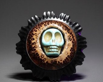 Botón de calavera de howlita