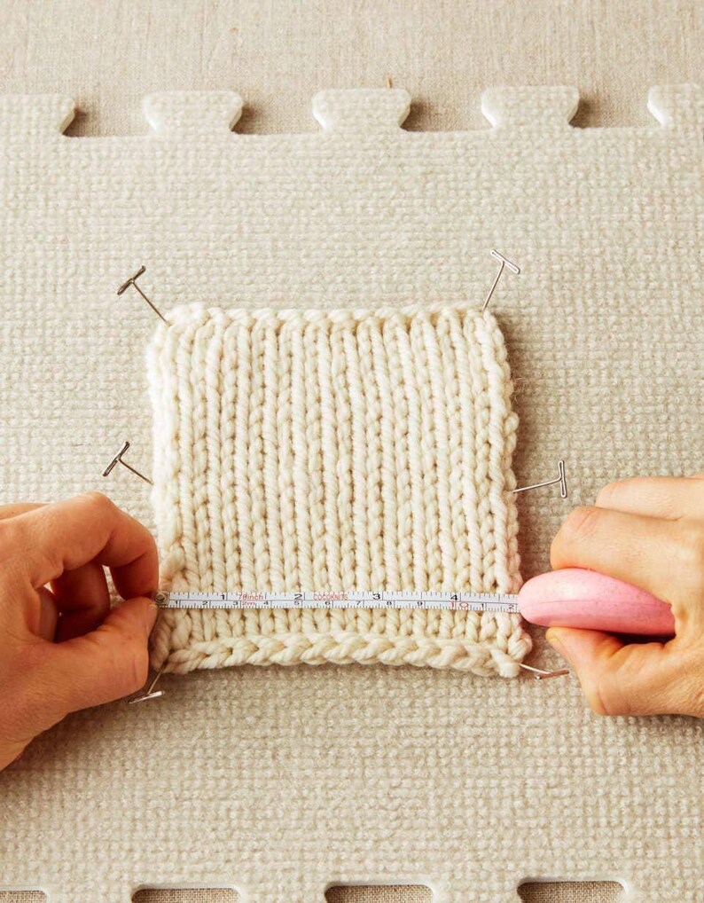 Knitting project in progress with Cocoknits tape measure being used for precision measurements.