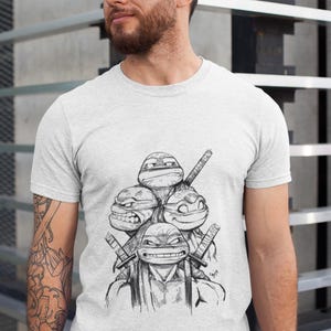 Camiseta gráfica de las Tortugas Ninja / Camiseta unisex de algodón suave para fanáticos de los cómics / Diseño divertido de dibujos animados para hombres y mujeres / Camiseta retro informal de las Tortugas