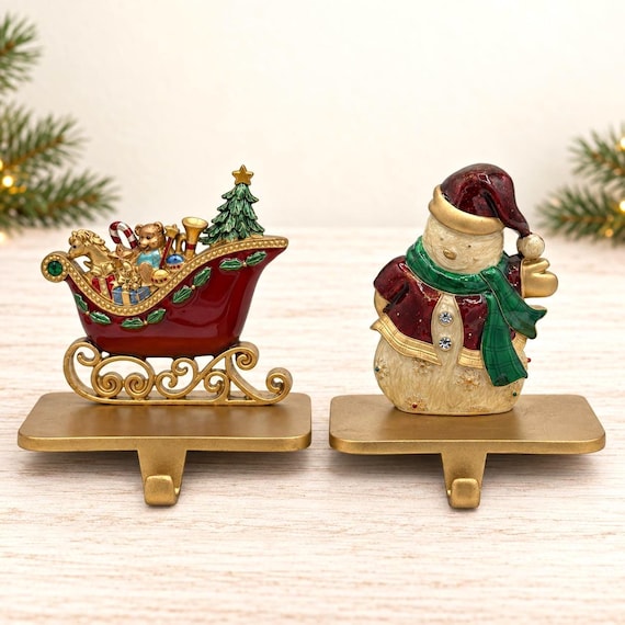 Vintage Jeweled Christmas Stocking Holders Set of 2 | Santa Claus & Toy Sleigh | Heavy Enamel Metal Traditional Mantel Hooks