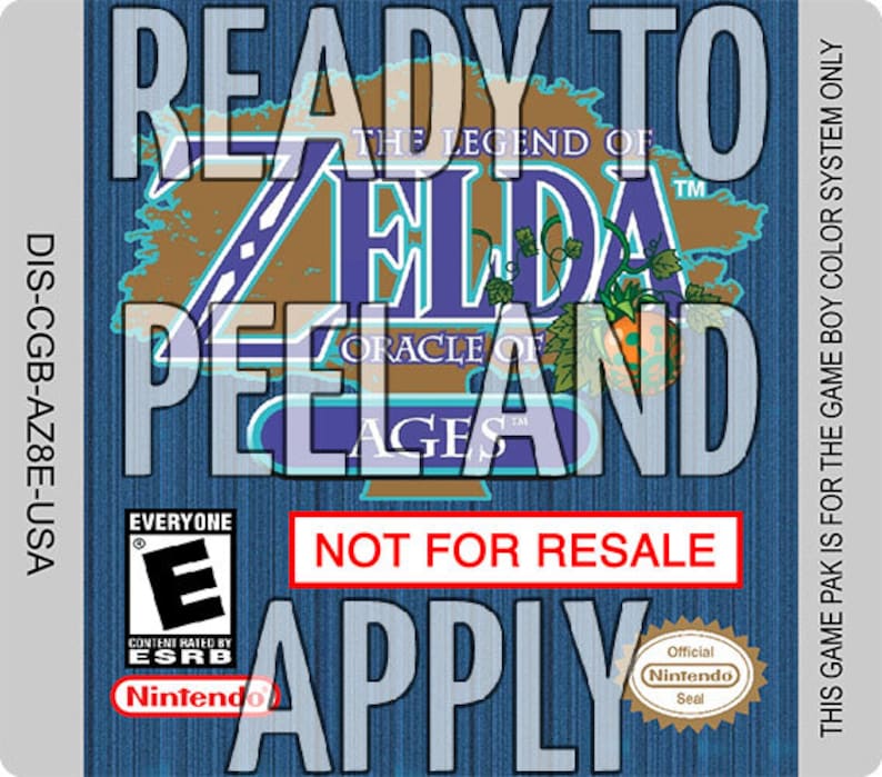 Może przedstawiać: Gra Game Boy Color w niebiesko-białej obudowie do gry The Legend of Zelda: Oracle of Ages. Etykieta zawiera napis "Ready to Peel and Apply" oraz "Not for Resale".