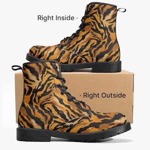May include: Two tiger-striped combat boots with black laces and soles. The boots are displayed on a cardboard box. The text "Right Inside" and "Right Outside" are visible on the image.
