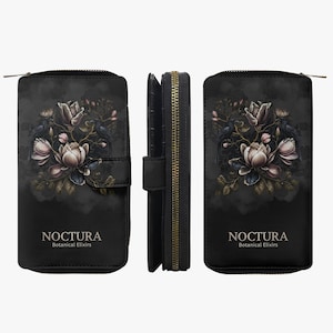 May include: Black wallet with a floral design featuring light pink and white flowers, dark leaves, and birds. The wallet has a zipper closure and the text "NOCTURA Botanical Elixirs".
