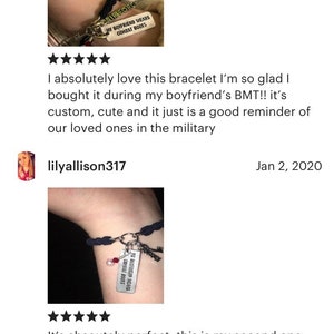 May include: Black braided bracelet with a silver charm that reads "My boyfriend wears combat boots".