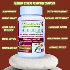 Peut inclure: Une bouteille blanche avec une &eacute;tiquette verte qui indique "GoodlifePick" et "Extra Strength Premium Ashwagandha 20:1 Extract + Root Powder + 5% Withanolides". La bouteille est &eacute;tiquet&eacute;e avec "Ashwagandha" et "12300 MG". La bouteille est pos&eacute;e sur une pile de rochers. La bouteille est entour&eacute;e de texte qui dit "Healthy Stress Response Support", "Mood Enhancer", "Immune Support", "Better Sleep & Relaxation", "Energy Support", "Adrenal Function", "Thyroid Health Support", "Hormonal Health Support", "Joint Health Support", "Muscle Health Support", et "Promotes Fertility".