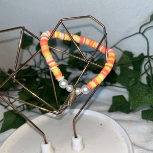Orange starfish and pearl bracelet