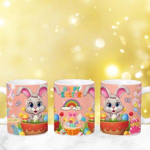May include: Three white ceramic mugs with a pink background and a cartoon bunny rabbit holding Easter eggs. The mugs have the text "Happy Easter" on the front.