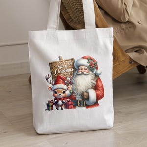 May include: White canvas tote bag with a Christmas design featuring Santa Claus and a reindeer. Santa is holding a sign that says "Merry Christmas".