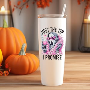 May include: White tumbler with a humorous graphic featuring a Scream mask wearing pink heart-shaped sunglasses and a pink boa, holding a knife and a glass of wine. The text reads "JUST THE TIP I PROMISE".