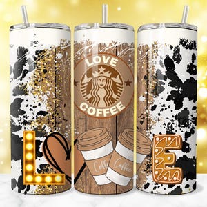 May include: Three stainless steel tumblers with a cow print design. The center tumbler features a brown wooden background with the text "Love Coffee" and a coffee cup graphic. The left tumbler has a light brown heart and a light up letter "L". The right tumbler has a gingerbread cookie letter "E".