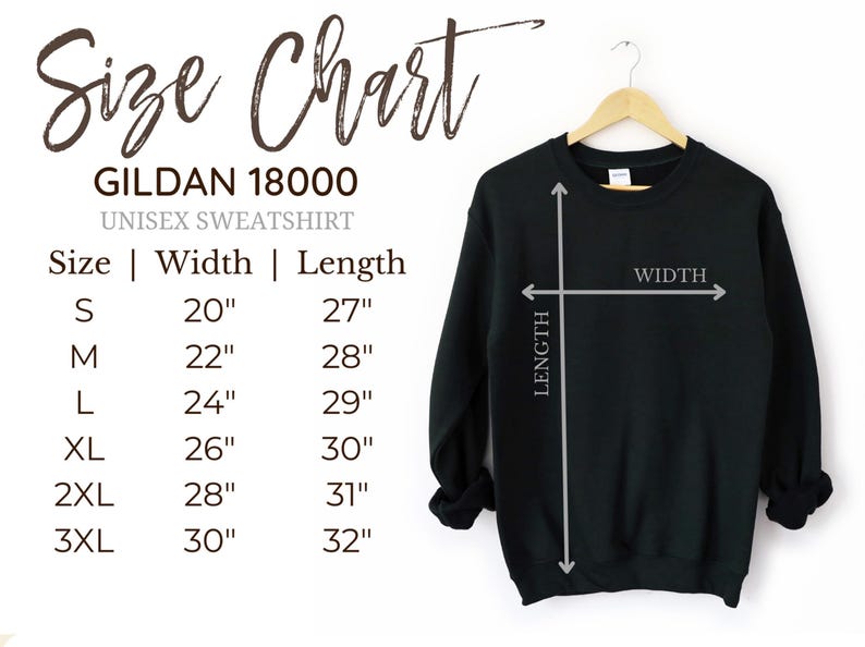 May include: A black Gildan 18000 unisex sweatshirt hangs on a wooden hanger. The image includes a size chart with measurements in inches for sizes S through 3XL. The chart shows the width and length of the sweatshirt.