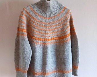 Hand knitted grey nordic wool sweater with a orange patterned yoke