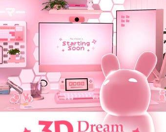 May include: A pink-themed gaming setup featuring a computer monitor displaying the text 'The stream is Starting Soon', a handheld gaming console, a mechanical keyboard, a mouse pad, hexagonal wall lights, and a large pink rabbit-shaped figure.