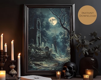 May include: A framed print of a spooky, moonlit forest scene with a stone building and a graveyard. The print is in a dark wood frame and is hanging on a dark wall. There are candles and a skull on a table in the foreground.