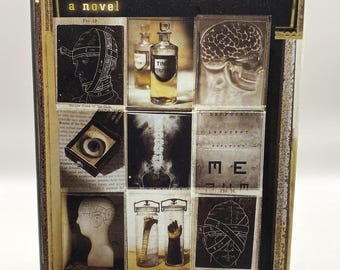 La lección de anatomía, novela de John David Morley, libro de tapa dura, primera edición de 1995.