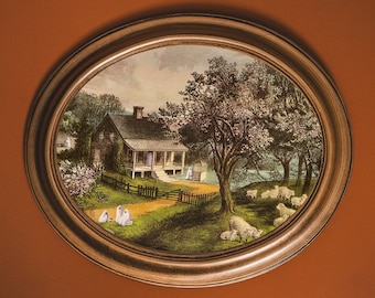 May include: A framed painting depicting a white farmhouse with a porch and a large tree in the foreground. The house is surrounded by a lush green lawn and a white picket fence. There are several white figures standing in the yard.