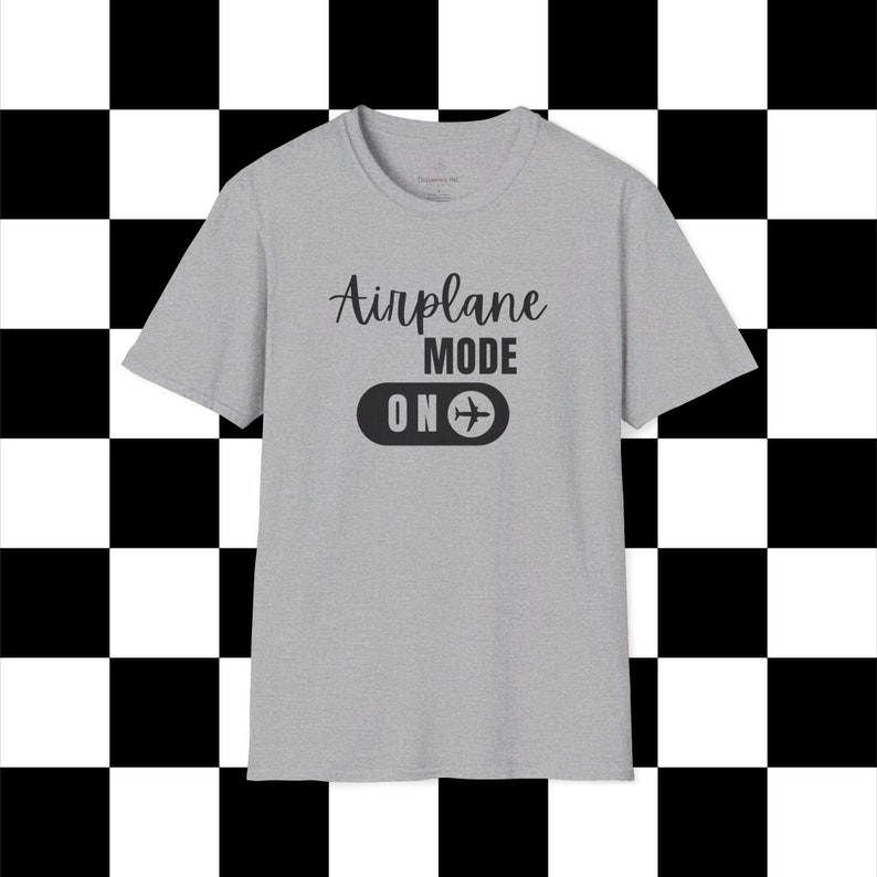 Gray t-shirt with black Airplane Mode ON design featuring a sliding switch graphic and plane icon.