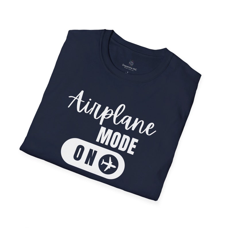 Navy blue t-shirt with white Airplane Mode ON design featuring a sliding switch graphic and plane icon.
