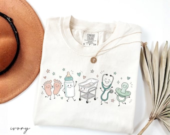Comfort Colors® Mother Baby Nurse Doodle Characters Shirt, Postpartum Nurse Tee, Nursery Nurse Shirt, Labor and Delivery Gift, MBU Unit Gift