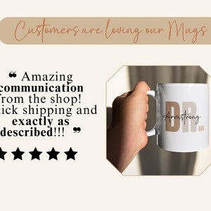 May include: White ceramic mug with a brown and beige design that says "DR. Armstrong". The mug is being held by a hand. The image includes a five-star review that says "Amazing communication from the shop! Quick shipping and exactly as described!!!"