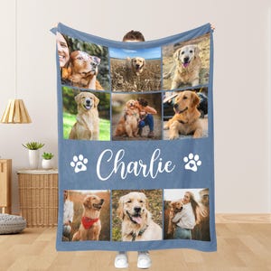 May include: A blue blanket featuring a collage of golden retriever photos. The blanket has the name "Charlie" in white script, along with paw print graphics. The photos show various golden retrievers in different settings.