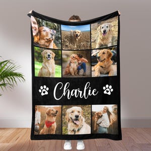 May include: Black fleece blanket featuring a collage of golden retriever photos. The blanket has a black background with white paw prints and the name "Charlie" in a cursive font. The photos show dogs in various settings.