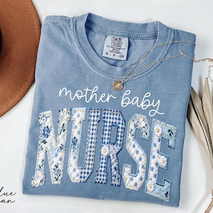 May include: A rustic wooden sign with the text "Welcome to our home" in white lettering. The sign features a distressed finish and a simple, inviting design, perfect for a front porch or entryway.