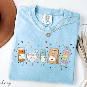 Comfort Colors® Pharmacist Doodle Characters Shirt, Pharmacy Technician Tee, CPhT Shirt, Gift For Pharmacy Tech, PharmD Graduation Gift