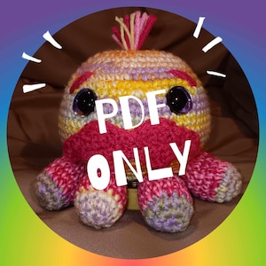 Op de afbeelding: Een kleurrijke gehaakte octopus met roze, gele, paarse en groene strepen. De octopus heeft grote zwarte ogen en een roze mond. De tekst "PDF ONLY" is over de afbeelding gelegd.