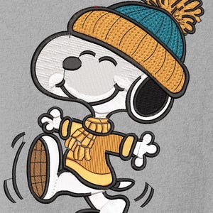 May include: A cartoon illustration of a white dog with black ears and a black nose, wearing a yellow and teal knit hat with a pom-pom, a yellow scarf, and a yellow sweater. The dog is mid-stride, with a happy expression, on a grey background.