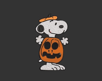 May include: Embroidered patch featuring Snoopy dressed as a jack-o'-lantern for Halloween. The patch shows Snoopy's white body, black ears, and orange pumpkin costume with a matching hat. The background is a solid dark gray.