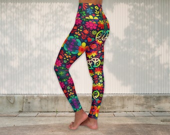 May include: Brightly coloured leggings with a dark blue base, patterned with flowers, peace symbols, and hearts. The leggings have a high waist and a close fit, suitable for yoga or everyday wear. The design incorporates pink, yellow, green, and blue hues.